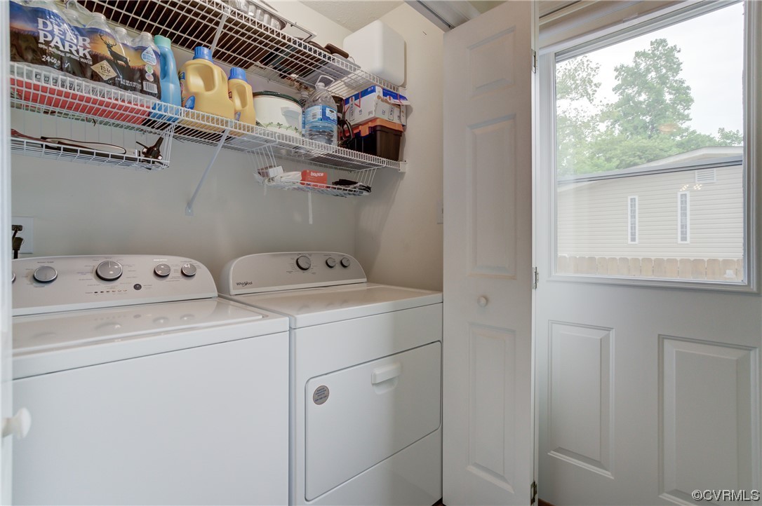 382 Hideaway Point Road Topping, VA 23169 - Photo 32 of 50 a utility room with dryer and washer