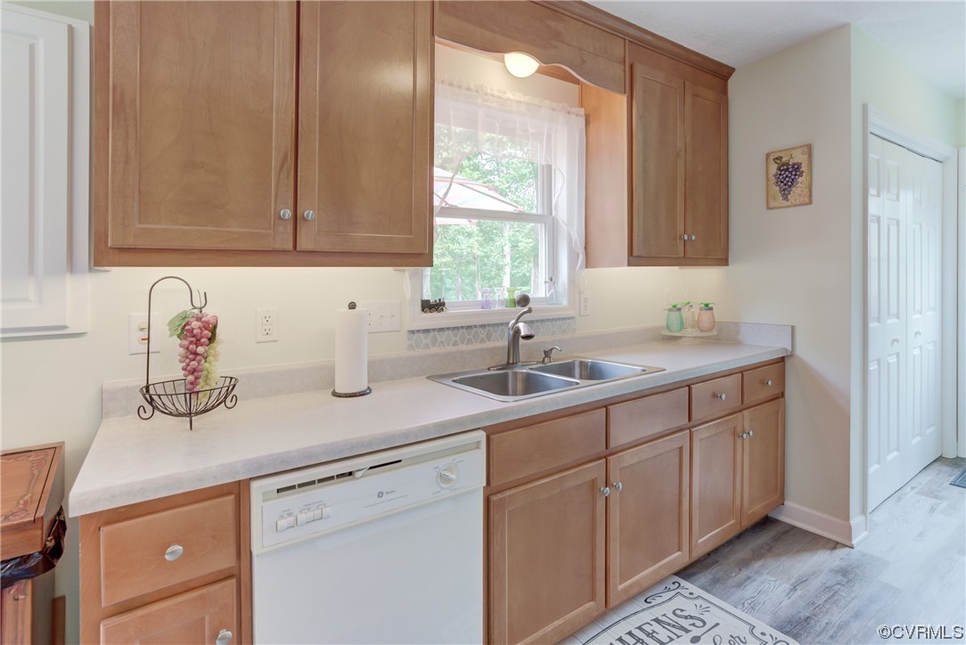 382 Hideaway Point Road Topping, VA 23169 - Photo 35 of 50 a kitchen with a sink and cabinets