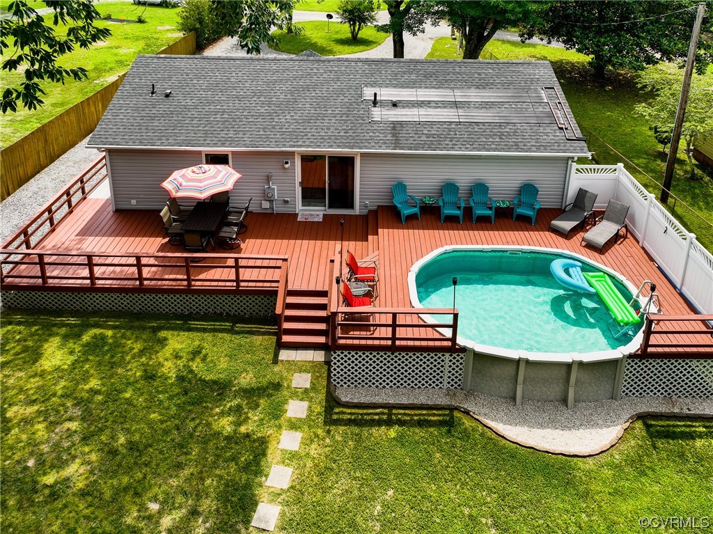 382 Hideaway Point Road Topping, VA 23169 - Photo 4 of 50 an aerial view of a house with swimming pool and outdoor seating