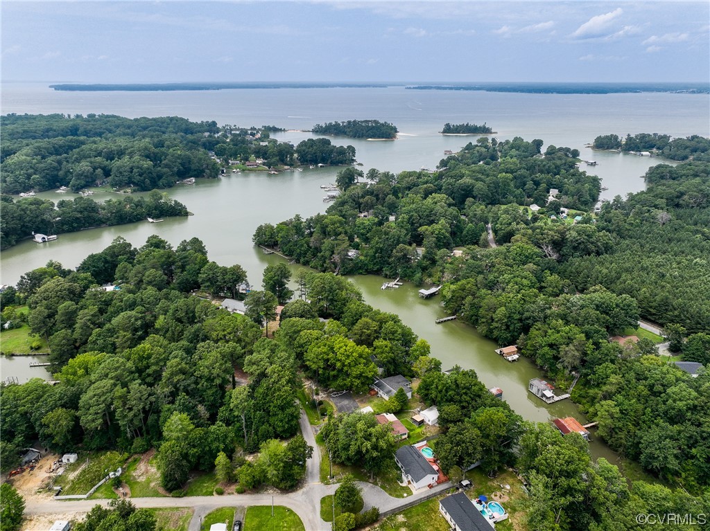 382 Hideaway Point Road Topping, VA 23169 - Photo 44 of 50 an aerial view of a house with yard and outdoor seating