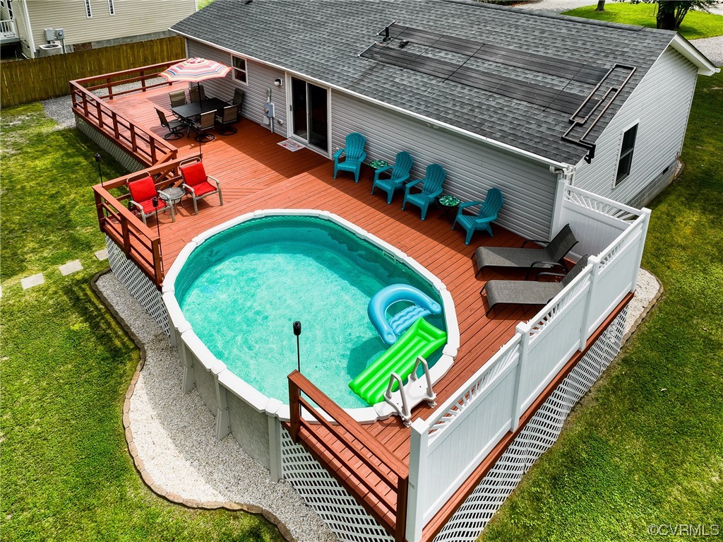 382 Hideaway Point Road Topping, VA 23169 - Photo 50 of 50 an aerial view of a house with a garden and deck