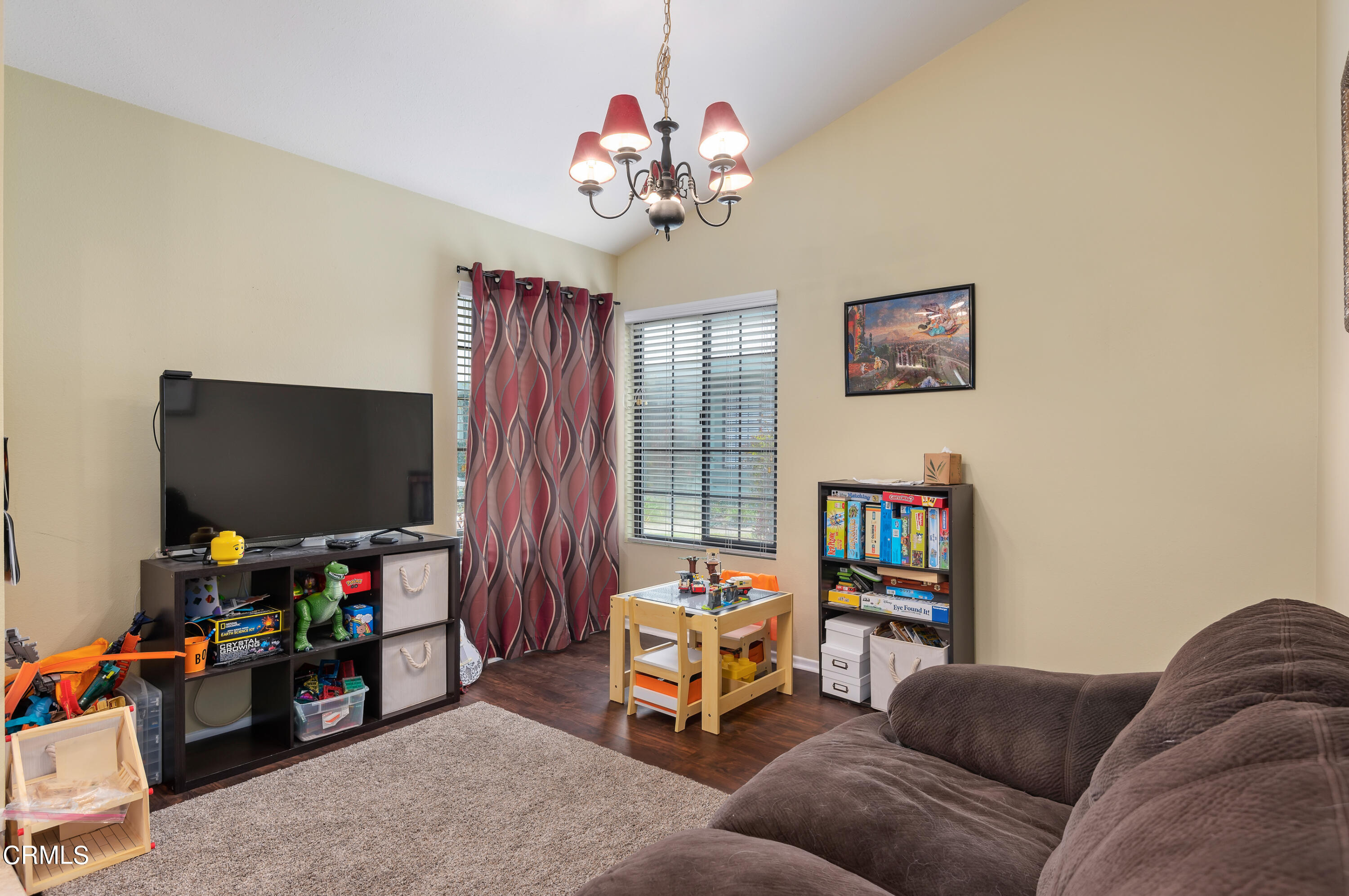 3550 Olds Road Oxnard, CA 93033 - Photo 3 of 26 a living room with furniture and a flat screen tv