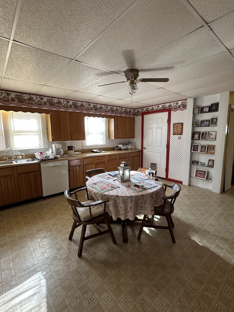 25 North Walnut Street Tamaroa, IL 62888 - Photo 16 of 18 a view of a dining room with furniture window and wooden floor