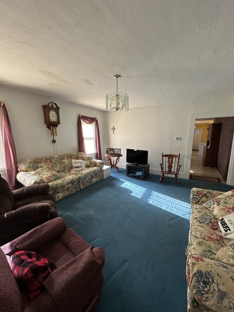 25 North Walnut Street Tamaroa, IL 62888 - Photo 17 of 18 a living room with furniture and a flat screen tv
