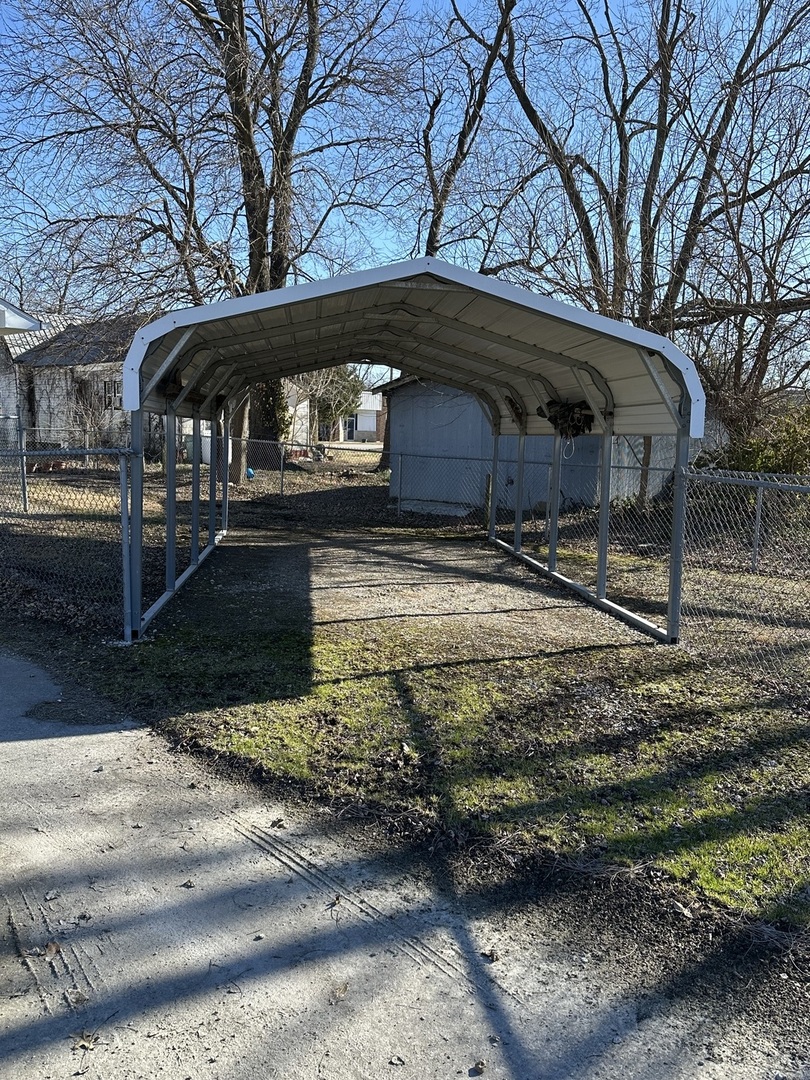 25 North Walnut Street Tamaroa, IL 62888 - Photo 4 of 18 a view of a house with large trees