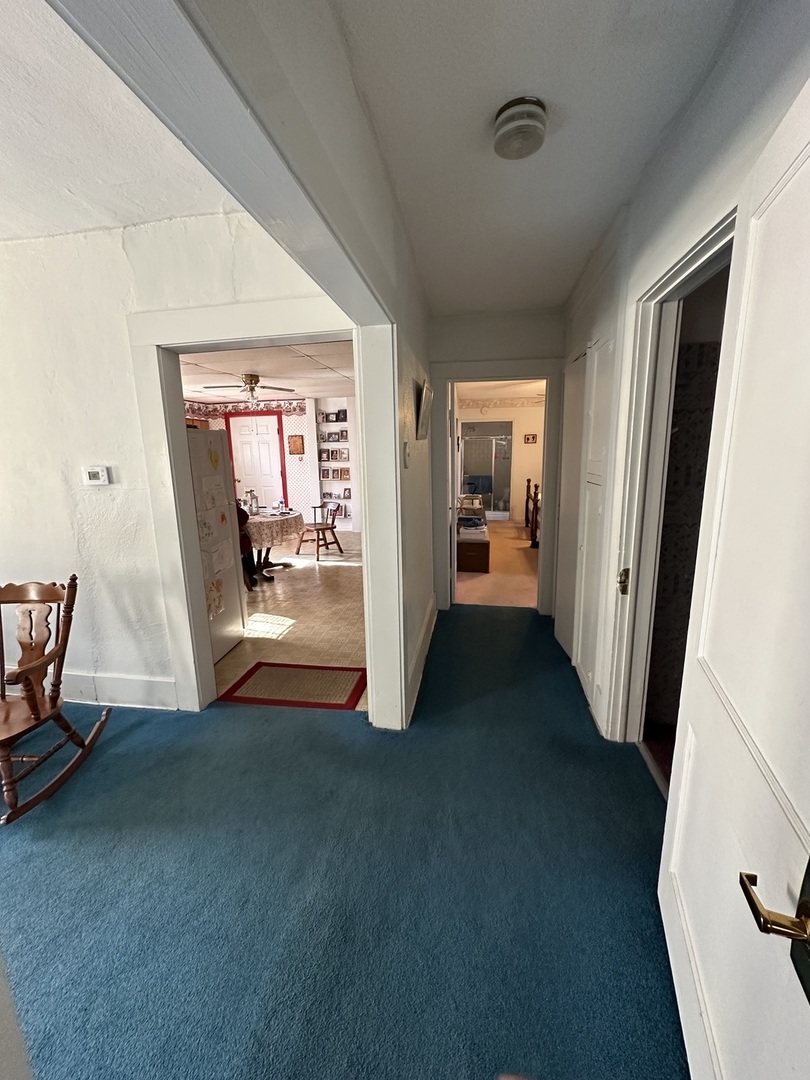 25 North Walnut Street Tamaroa, IL 62888 - Photo 8 of 18 a view of a hallway with furniture and front door