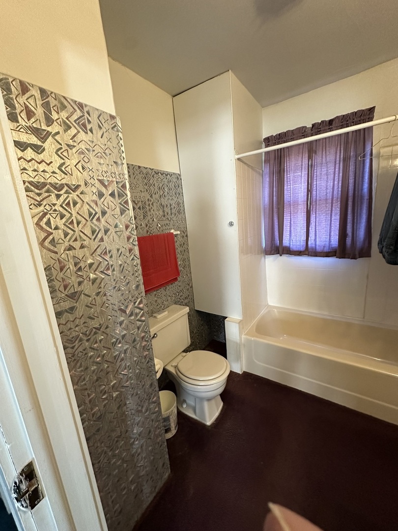25 North Walnut Street Tamaroa, IL 62888 - Photo 9 of 18 a bathroom with a toilet and a shower