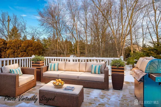 a outdoor living space with furniture and garden view