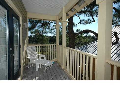 228 Hidden Lake Way Santa Rosa Beach, FL 32459 - Photo 7 of 11 a balcony view with a couple of chairs