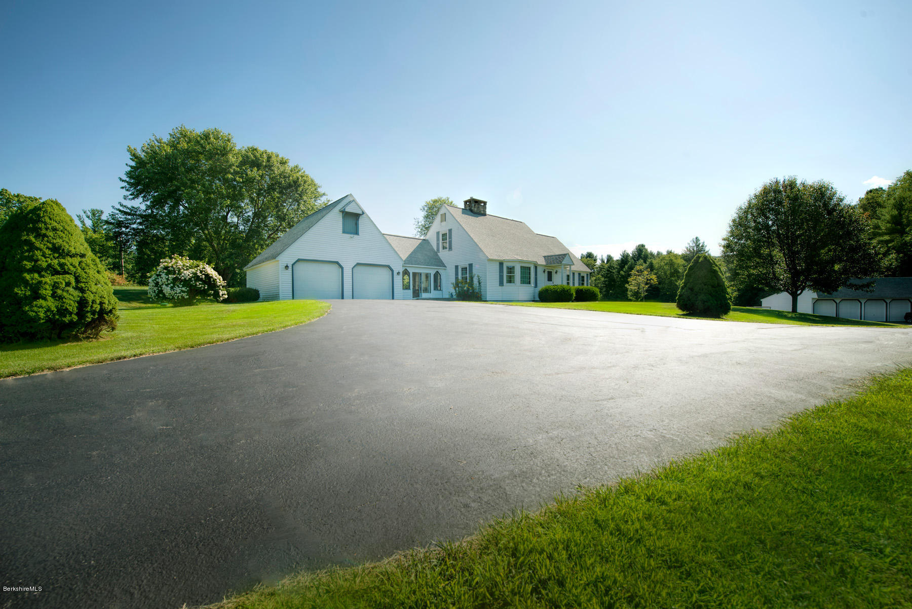 540 Main Road Monterey, MA 01245 - Photo 1 of 26 a view of an outdoor space and a yard