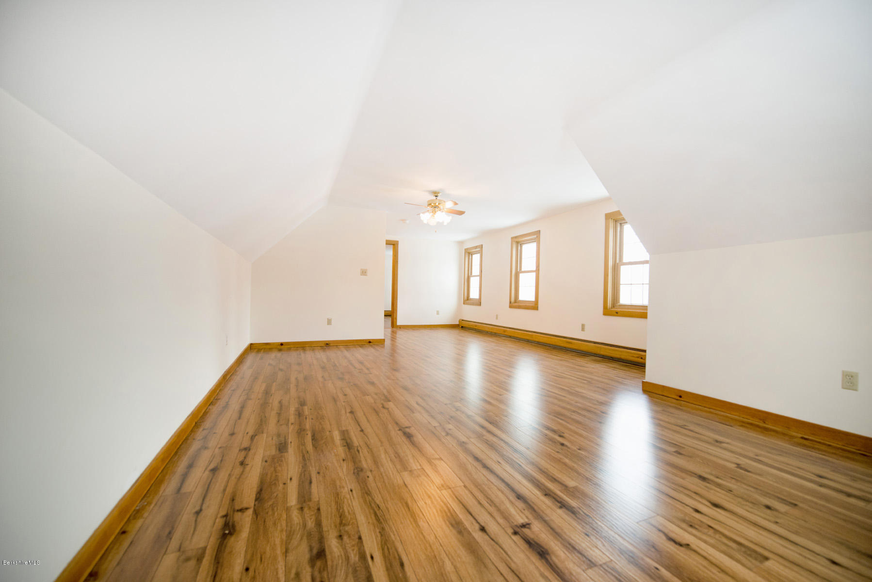 540 Main Road Monterey, MA 01245 - Photo 15 of 26 a view of empty room with wooden floor and fan