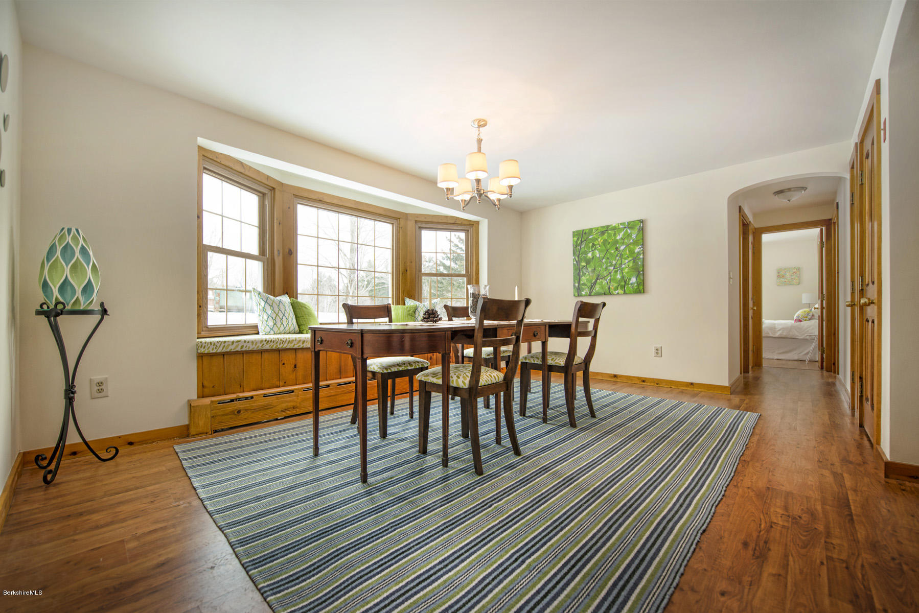 540 Main Road Monterey, MA 01245 - Photo 6 of 26 a view of a a dining room with furniture window and wooden floor