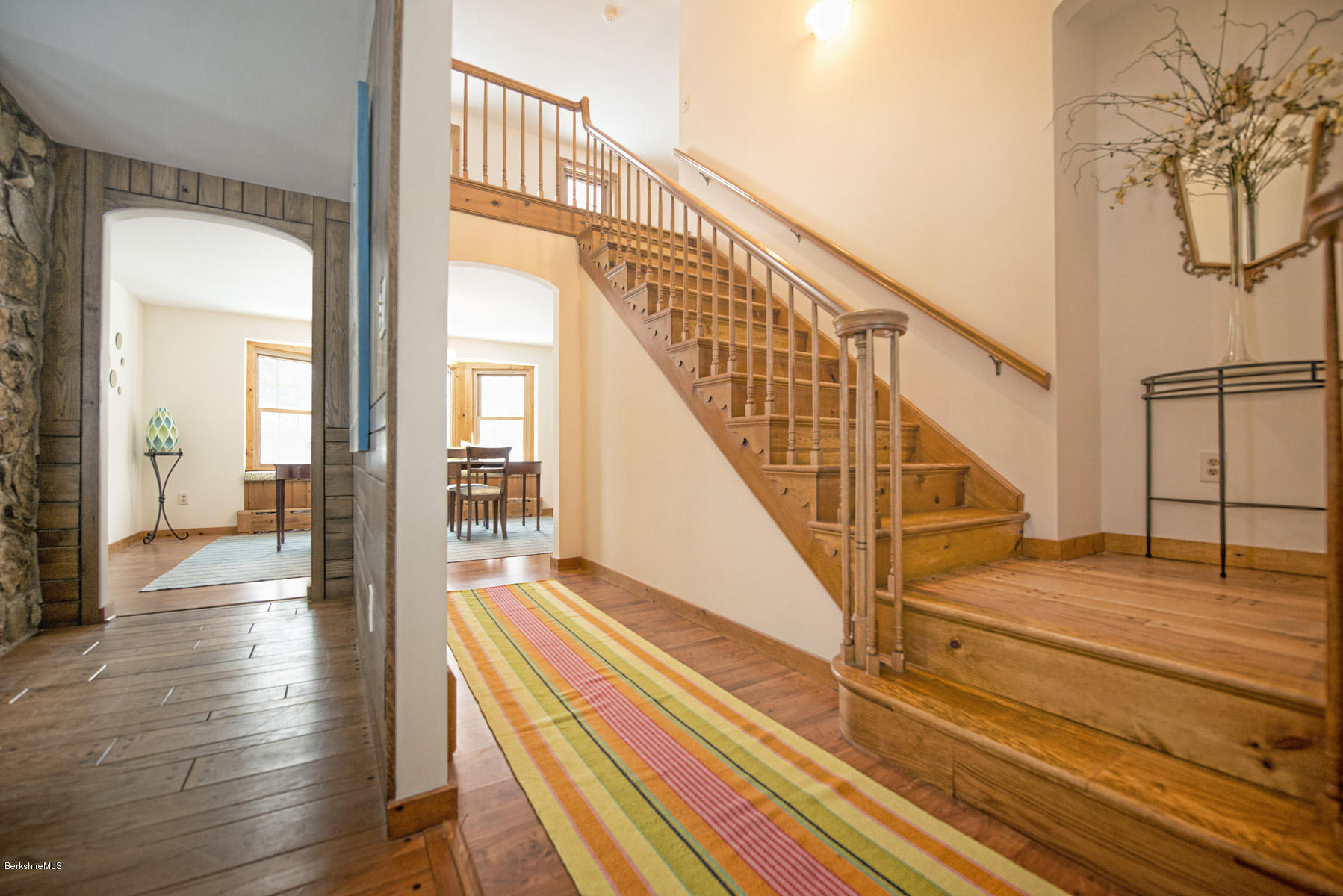 540 Main Road Monterey, MA 01245 - Photo 10 of 26 a view of staircase with white walls and railing next to a window