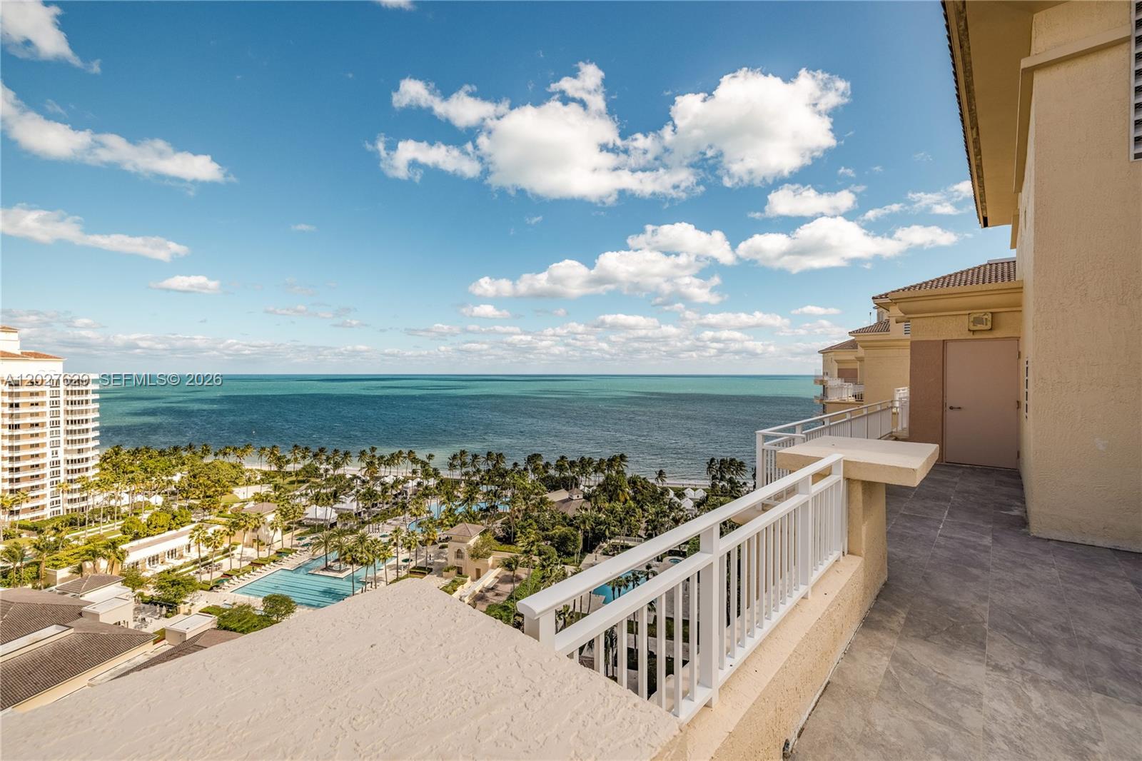 799 Crandon Boulevard, Unit PH8 Key Biscayne, FL 33149 - Photo 29 of 47 a view of a balcony with wooden floor