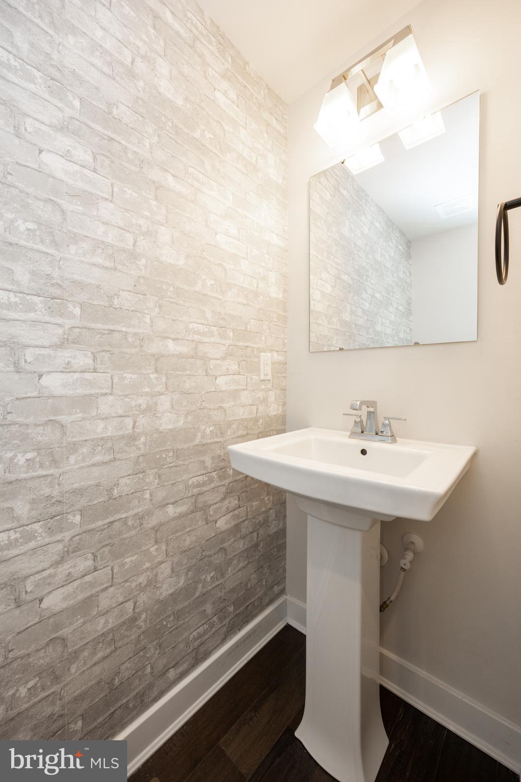 131 Mulberry Drive Malvern, PA 19355 - Photo 12 of 37 a bathroom with a sink a mirror and shower