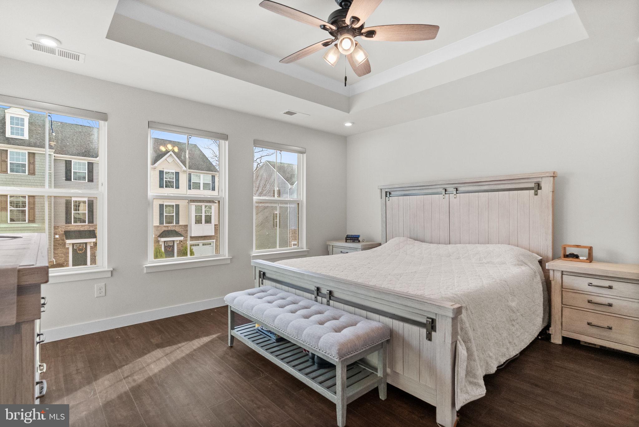 131 Mulberry Drive Malvern, PA 19355 - Photo 13 of 37 a bedroom with a bed next to a window and a chandelier