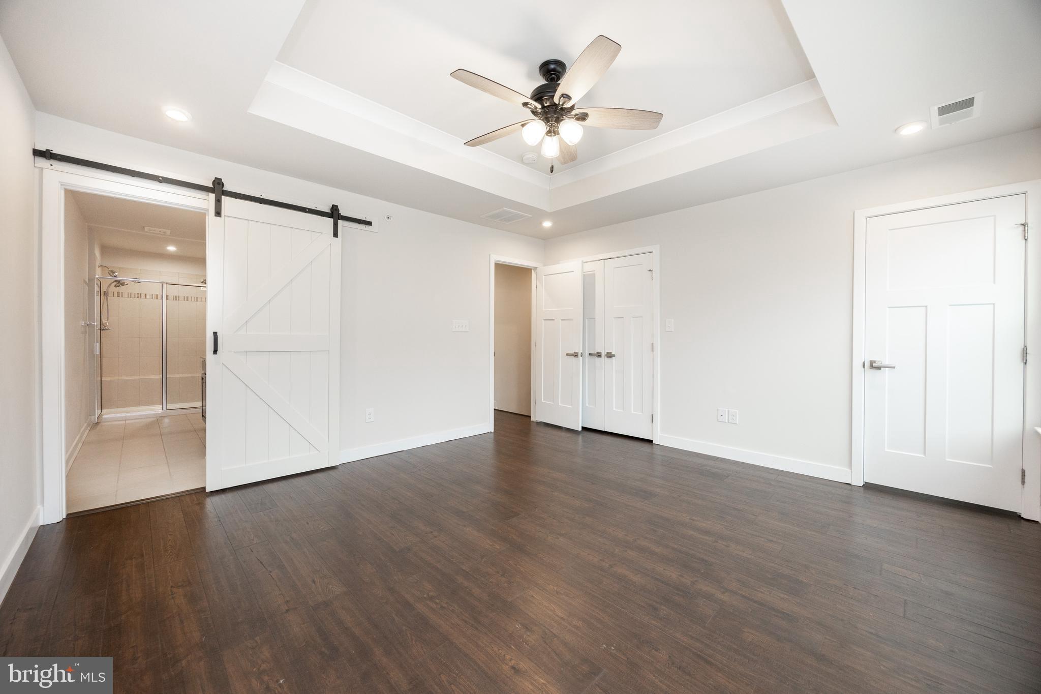 131 Mulberry Drive Malvern, PA 19355 - Photo 19 of 37 a view of an empty room with wooden floor