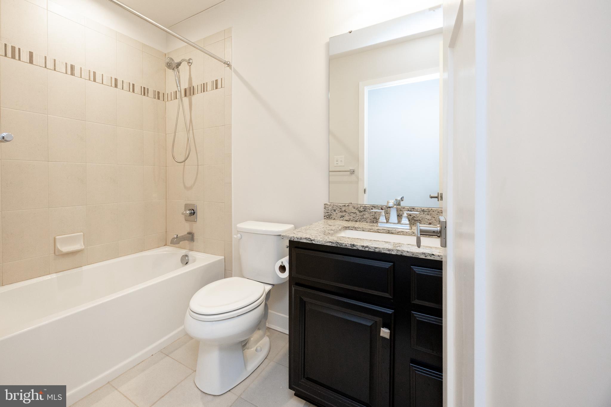 131 Mulberry Drive Malvern, PA 19355 - Photo 20 of 37 a bathroom with a sink toilet vanity and shower