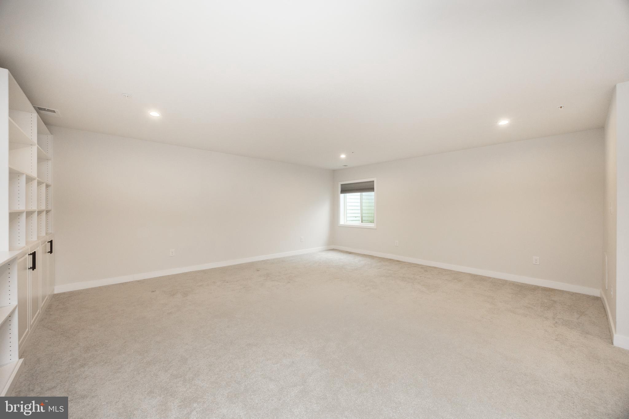 131 Mulberry Drive Malvern, PA 19355 - Photo 25 of 37 a view of an empty room with a window