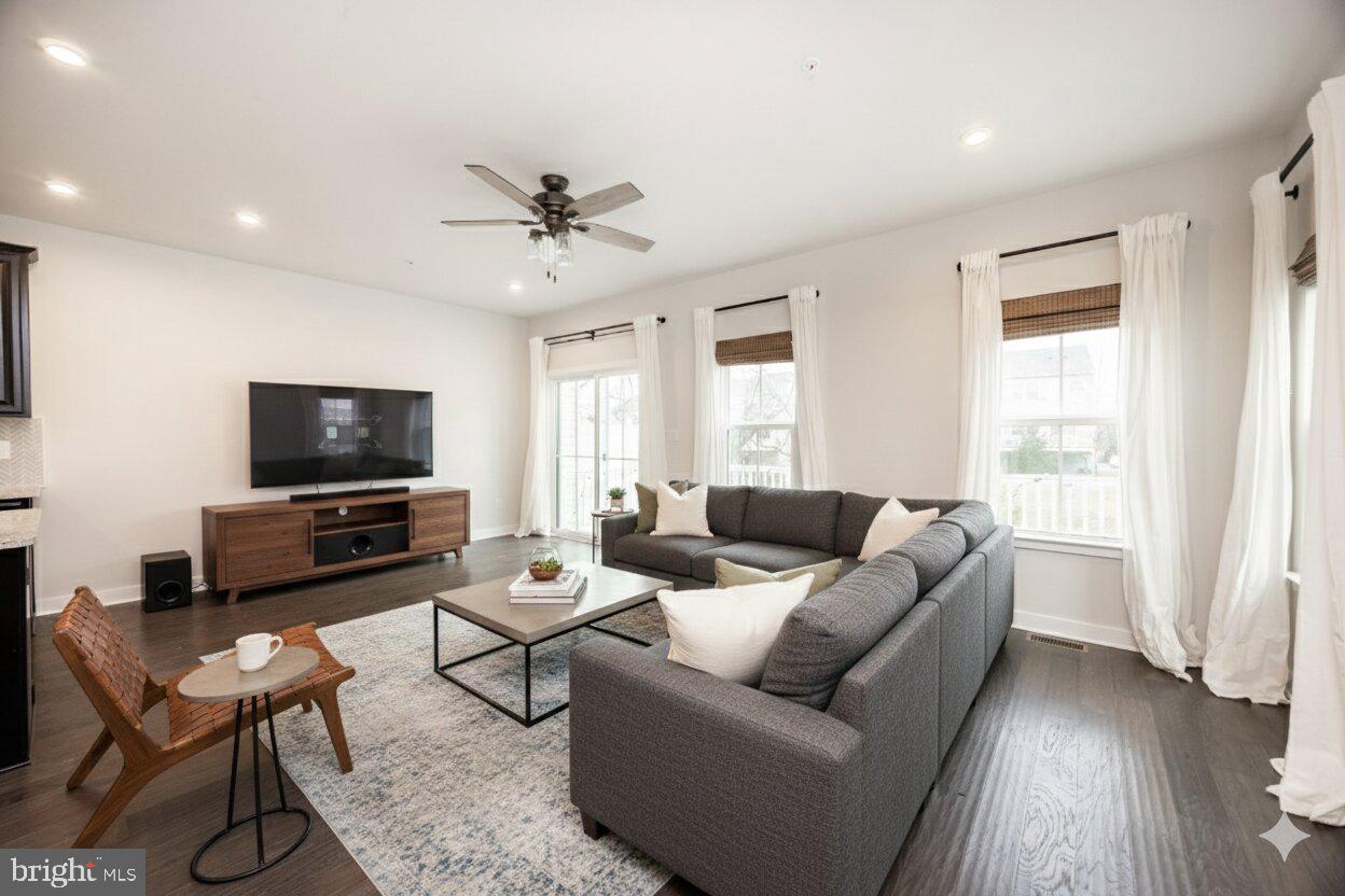 131 Mulberry Drive Malvern, PA 19355 - Photo 10 of 37 a living room with furniture and a flat screen tv