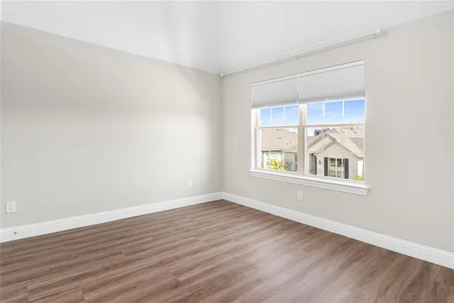 a bathroom with a tub sink and a mirror