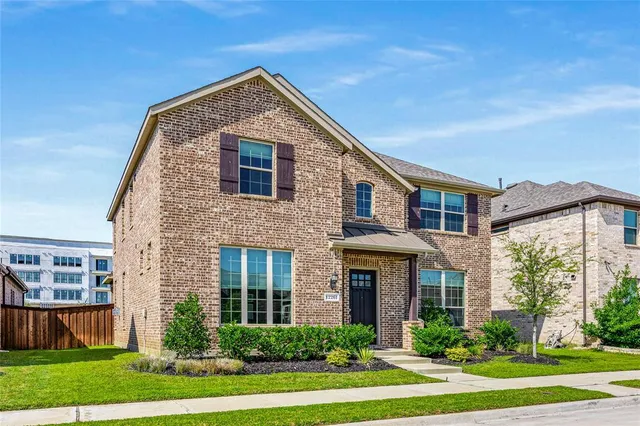 a bathroom with a window and a shower