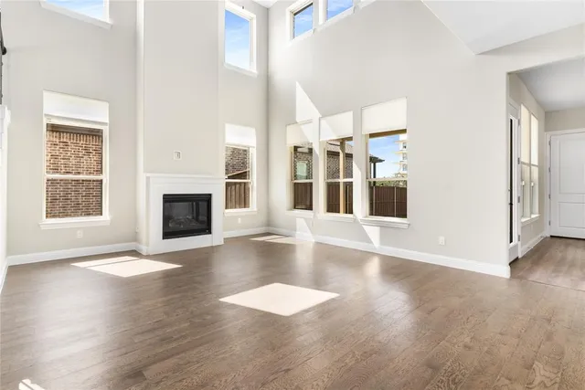 a view of an entryway with wooden floor