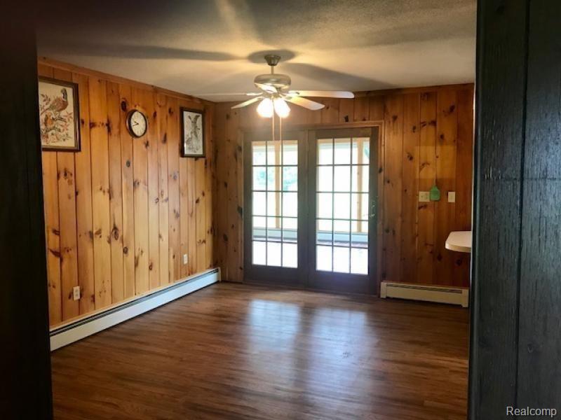 6436 Rossman Road Kingston, MI 48741 - Photo 12 of 16 6436 Dinning room leading to sun room.jpg