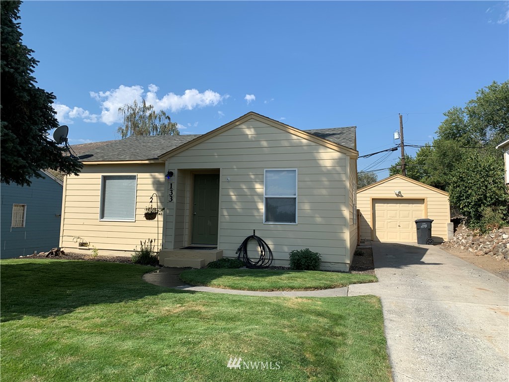 133 Columbia Road Ephrata, WA 98823 - Photo 1 of 29 a house view with a garden space