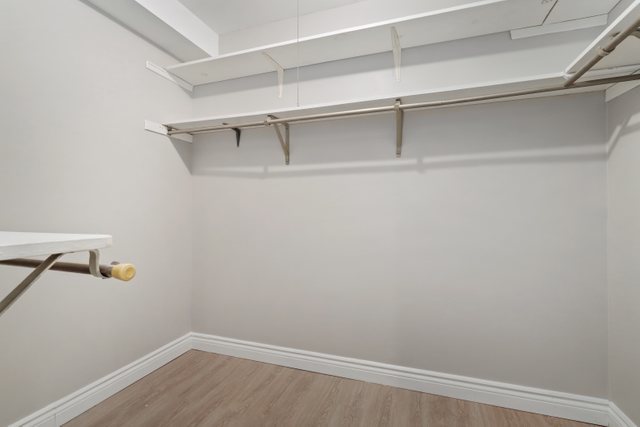 4700 Old Orchard Road, Unit 403 Skokie, IL 60076 - Photo 18 of 21 a view of a room with racks on the wall