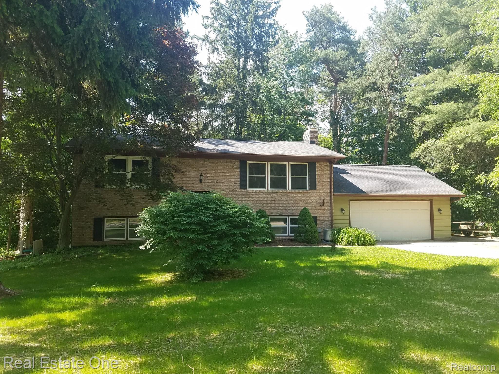 12176 Pine Ridge Drive Perry, MI 48872 - Photo 30 of 33 pine rdige front.jpg