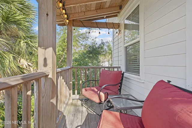 a view of a balcony with chair