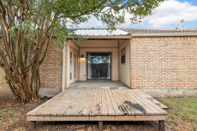 a view of a house with a porch