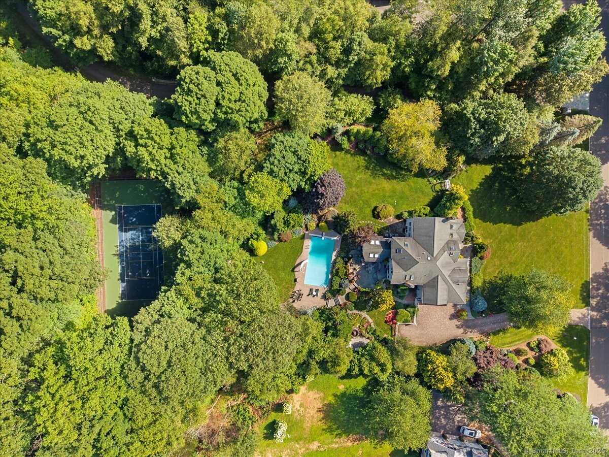 50 Abrams Road Cheshire, CT 06410 - Photo 1 of 1 an aerial view of residential house with outdoor space and trees all around