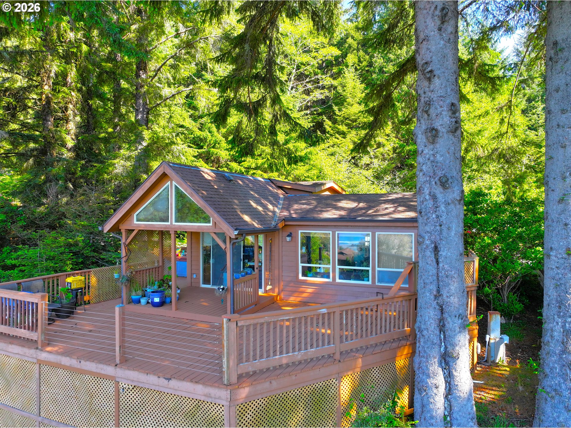 19921 Whaleshead Road, Unit U25 Brookings, OR 97415 - Photo 6 of 47 a view of front of house with a yard