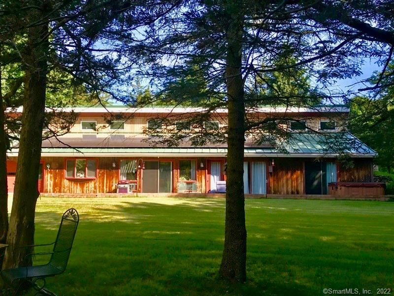 412 Clubhouse Road Lebanon, CT 06249 - Photo 1 of 1 a view of a house with a yard