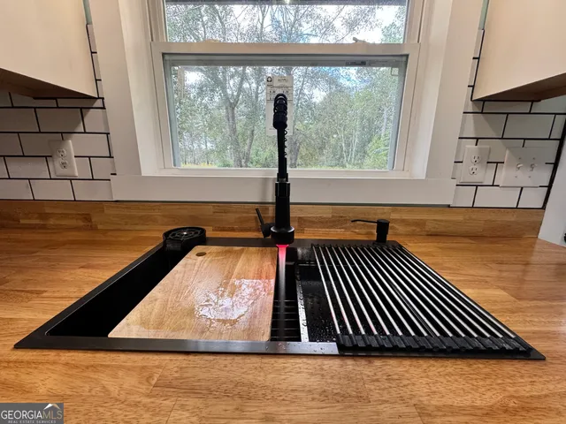 a view of outdoor space with swimming pool