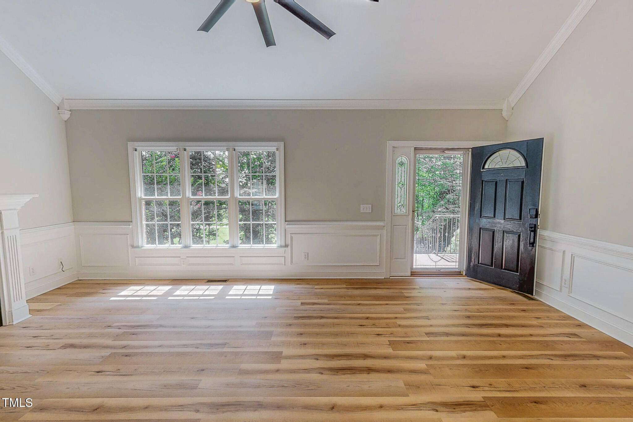 417 Rassie Crabtree Road Rougemont, NC 27572 - Photo 19 of 37 a view of an empty room with window and wooden floor