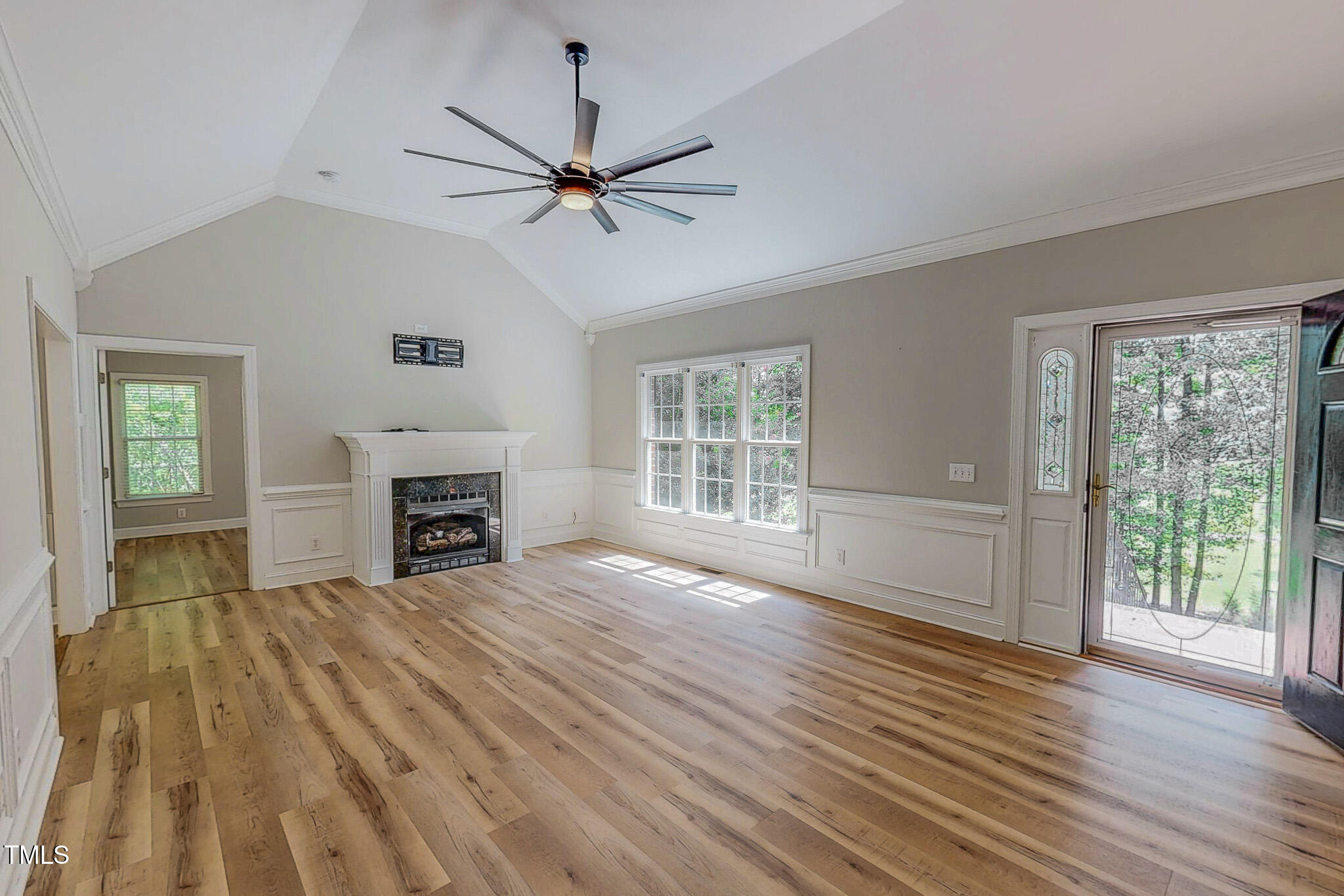 417 Rassie Crabtree Road Rougemont, NC 27572 - Photo 2 of 37 a view of empty room with wooden floor and fan