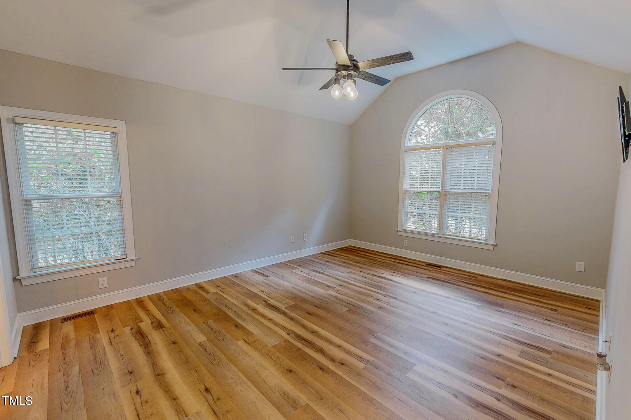 417 Rassie Crabtree Road Rougemont, NC 27572 - Photo 23 of 37 a view of empty room with wooden floor and fan