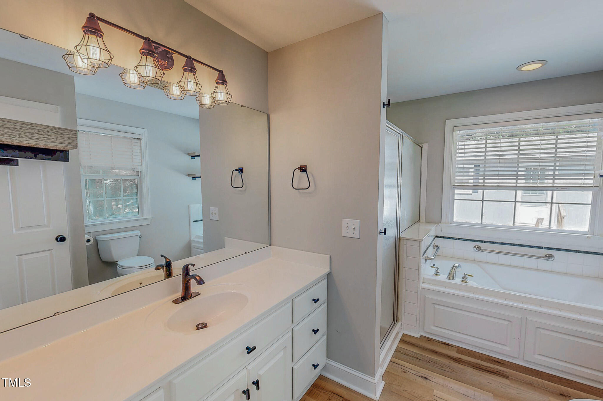 417 Rassie Crabtree Road Rougemont, NC 27572 - Photo 27 of 37 a bathroom with a sink and a mirror