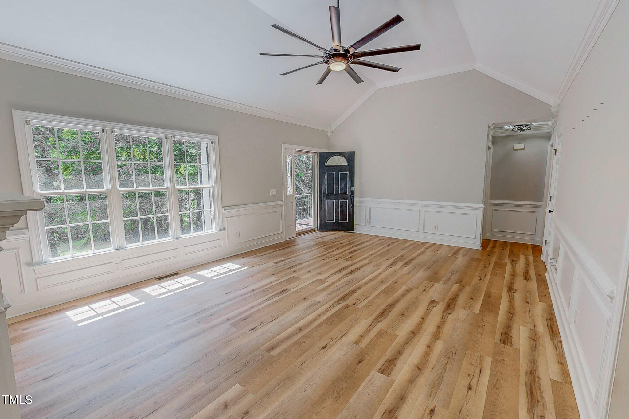 417 Rassie Crabtree Road Rougemont, NC 27572 - Photo 7 of 37 a view of empty room with wooden floor and fan