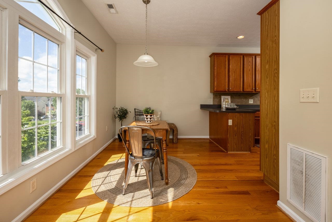 1398 Verdant Spring Lane Harrisonburg, VA 22801 - Photo 17 of 43 a dining room with furniture and a window