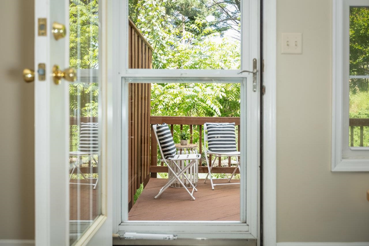 1398 Verdant Spring Lane Harrisonburg, VA 22801 - Photo 21 of 43 a view of a balcony with wooden floor and a porch