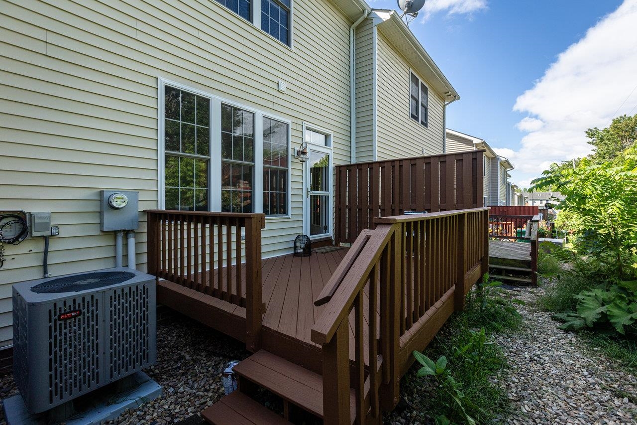 1398 Verdant Spring Lane Harrisonburg, VA 22801 - Photo 25 of 43 a view of a house with wooden fence and a porch