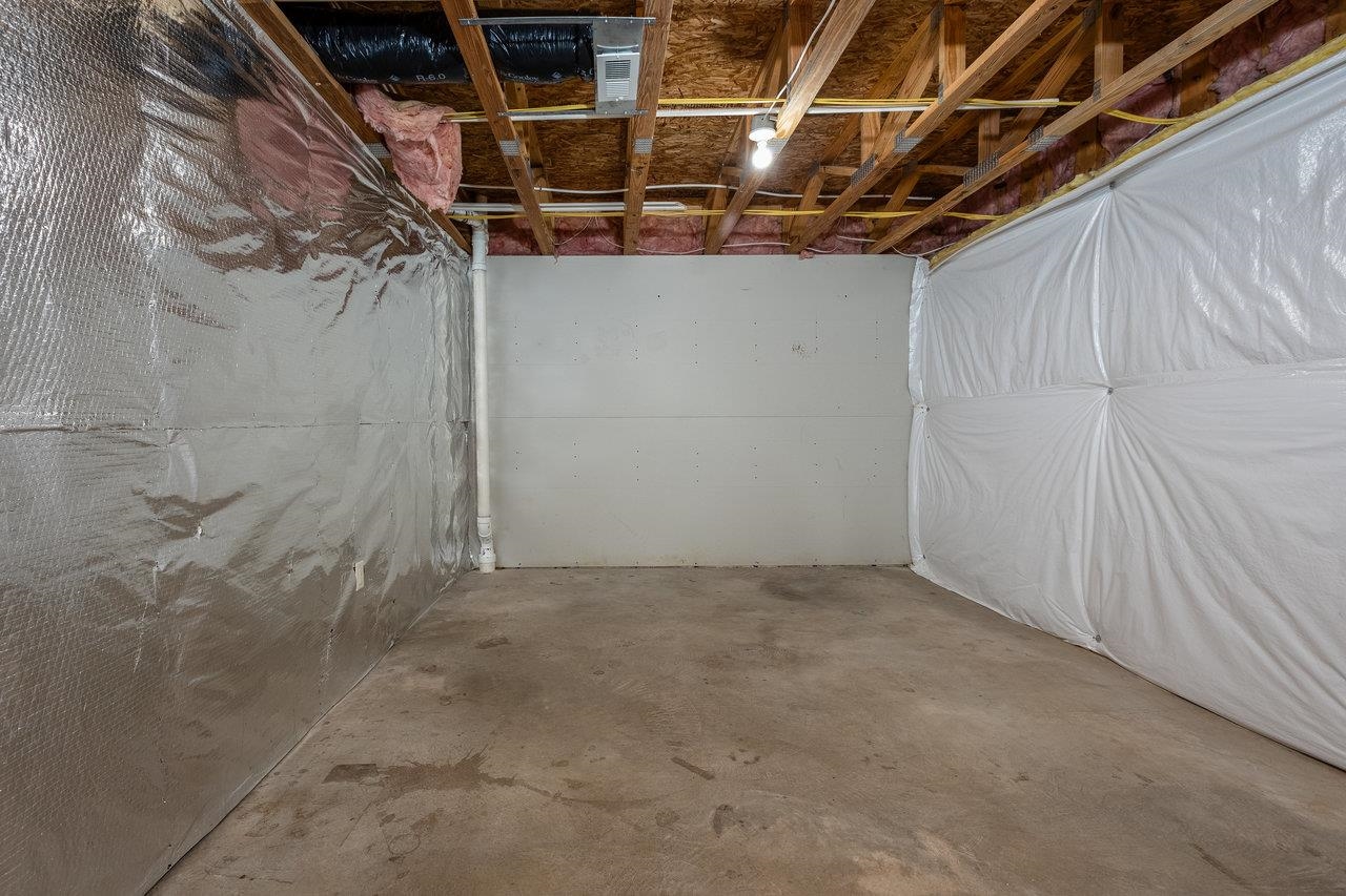 1398 Verdant Spring Lane Harrisonburg, VA 22801 - Photo 39 of 43 a view of a room with racks on the wall
