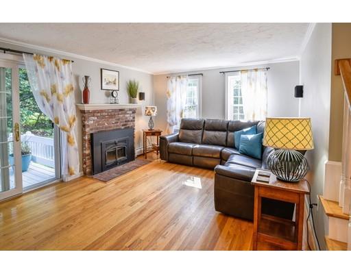 406 Sterling Road Holden, MA 01522 - Photo 11 of 42 a living room with furniture and a fireplace