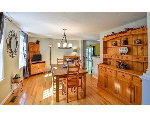 406 Sterling Road Holden, MA 01522 - Photo 12 of 42 a living room with stainless steel appliances kitchen island granite countertop furniture and a kitchen view