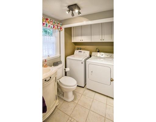 406 Sterling Road Holden, MA 01522 - Photo 14 of 42 a bathroom with a toilet a sink and a mirror