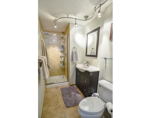 406 Sterling Road Holden, MA 01522 - Photo 17 of 42 a bathroom with a toilet a sink and mirror